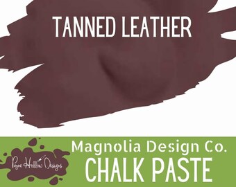 May include: A dark brown swatch of Magnolia Design Co. chalk paste labeled TANNED LEATHER. The product packaging features a green rectangular base with white text reading Magnolia Design Co. CHALK PASTE and a Payne Hollow Designs logo.