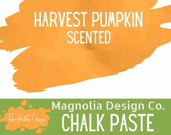 May include: A container of Magnolia Design Co. chalk paste with a large orange brushstroke graphic featuring the white text HARVEST PUMPKIN SCENTED. The lower section is a green band with the white text Magnolia Design Co. CHALK PASTE.