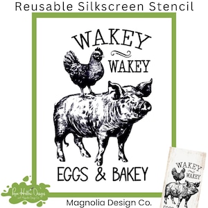May include: A reusable silkscreen stencil featuring a black ink illustration of a chicken standing on a pig. The text reads WAKEY WAKEY above the animals and EGGS & BAKEY below. The design is presented on a white background with a green border.