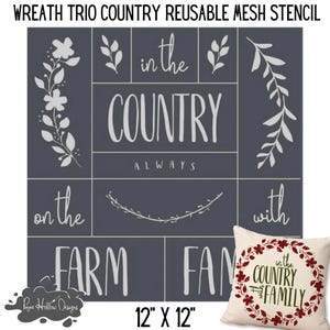 May include: A dark gray reusable mesh stencil featuring the text WREATH TRIO COUNTRY REUSABLE MESH STENCIL, in the COUNTRY, ALWAYS, on the, with, FARM, FAM, and floral designs. A 12 inch by 12 inch square pillow with a red wreath and green text is shown.