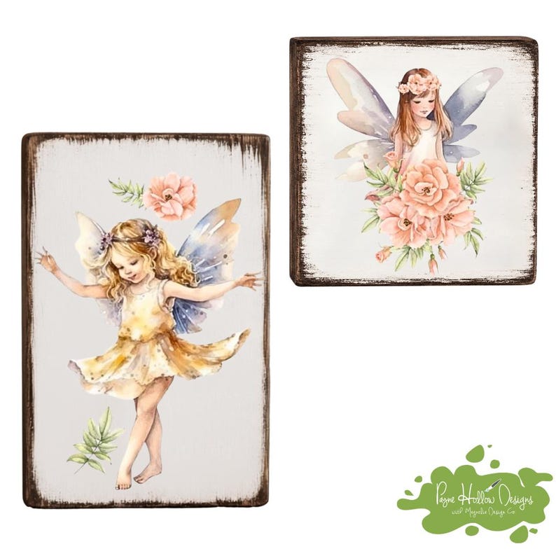 May include: Two rectangular wooden signs with distressed dark edges. One vertical sign features a blonde fairy in a yellow dress with blue wings and a pink flower. The square sign shows a fairy with brown hair, wings, and a large bouquet of pink flowers.