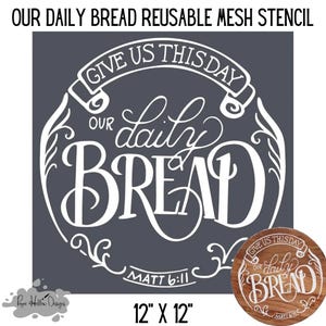 May include: A 12-inch by 12-inch reusable mesh stencil featuring the text "Give us this day our daily bread" in a decorative font with a banner and floral accents. The stencil also includes the scripture reference "Matt 6:11".