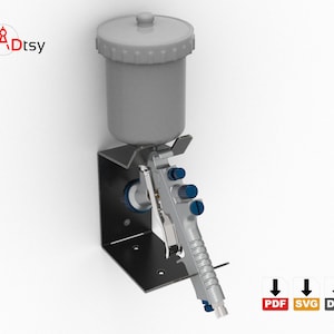 A side view of the paint gun stand in use, holding a spray gun on a wall.