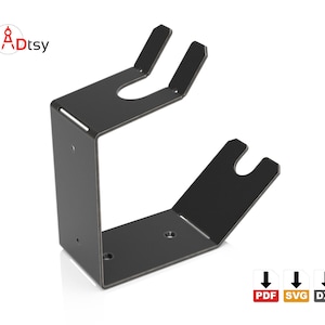 The empty, wall-mounted spray gun holder, showcasing its simple sheet metal bending design.