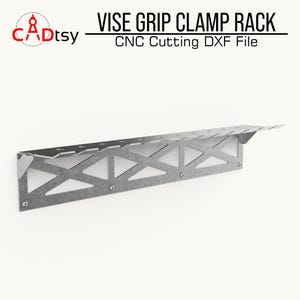 An angled view of the empty metal clamp rack, showing its geometric construction cutting and design for a laser table wall cut.