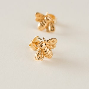 Bee stud earrings.