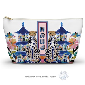 May include: A set of three ceramic nesting bowls in shades of blue, green, and white. The bowls have a speckled glaze and a simple design. The largest bowl is approx. 18 cm in diameter.