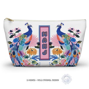 May include: A set of three ceramic mugs with a speckled, matte finish in cream, light grey, and dark grey. Each mug has a simple, minimalist design and a rounded handle.