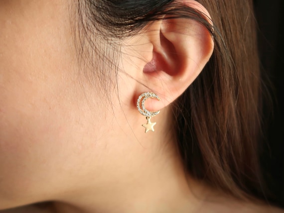 Dangle star and moon earrings store