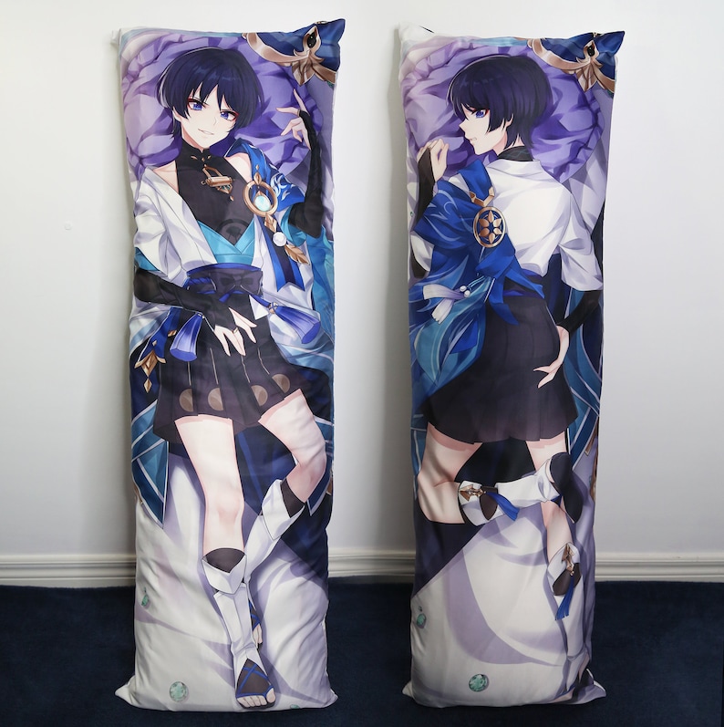 May include: A long body pillow featuring an anime character with blue hair, wearing a blue and white outfit with a black skirt. The character is standing with their arms raised, and the background is a purple and white pattern.