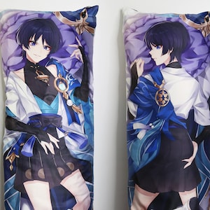 May include: A long body pillow featuring an anime character with blue hair, wearing a white shirt with a blue and gold sash, and a black skirt. The character is standing with one hand on their hip and the other hand raised.