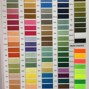 May include: A color chart of embroidery floss with numbered thread colors. The chart includes a variety of colors, including red, blue, green, yellow, orange, purple, pink, brown, and black. The chart also includes a section for neon shades.