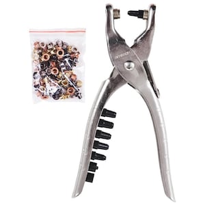 May include: A silver-colored eyelet setter tool with the text "amtech" printed on the side. A clear plastic bag filled with assorted metallic eyelets is to the left. Black plastic attachments are on the tool's handle.