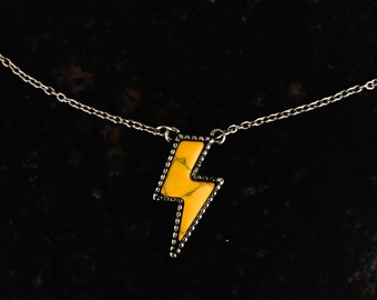 Yellow lightning bolt silvertone necklace