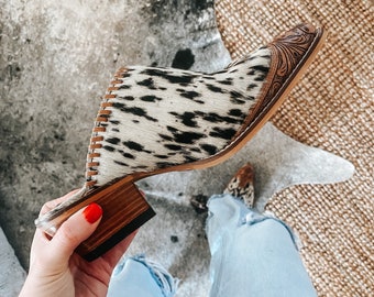 Western leather tooled mules with cowhide
