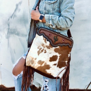 Genuine cowhide and leather tassel bag