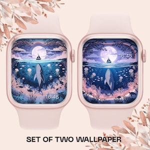 May include: Two smartwatches with identical screens showing an underwater scene with a whale, jellyfish, and a sailboat under a full moon. The watch cases are pale pink. The text "SET OF TWO WALLPAPER" is at the bottom of the image.