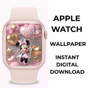 Puede incluir: Un Apple Watch rosa con un fondo de pantalla de Minnie Mouse. El fondo de pantalla presenta a Minnie sosteniendo un globo en forma de coraz&oacute;n, rodeada de estrellas doradas y globos en forma de coraz&oacute;n rosas. El texto dice "APPLE WATCH WALLPAPER DESCARGA DIGITAL INSTANT&Aacute;NEA."