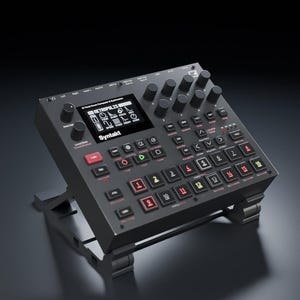 May include: A black Elektron Syntakt 12-track drum computer and synthesiser on a stand. The device features a central screen displaying "METROPOLIS" and "Syntakt," numerous black rotary knobs, and a grid of sixteen numbered buttons with red lighting.