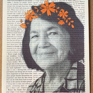 May include: A page from a book with text about women's place in history and the importance of voting. The text is surrounded by orange flowers. The text includes the phrase "Designed by The Wordy Feminist".