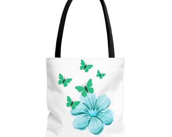 Bolsa de mano con estampado floral de mariposas verdes y flores color aguamarina