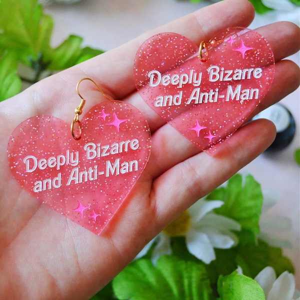 Acrylic Deeply Bizarre and Anti-Man Doll Movie Review Parody Glittery Heart Statement Earrings