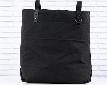 Black Waxed Canvas Portsmith Tote Bag with black leather straps and black rivets