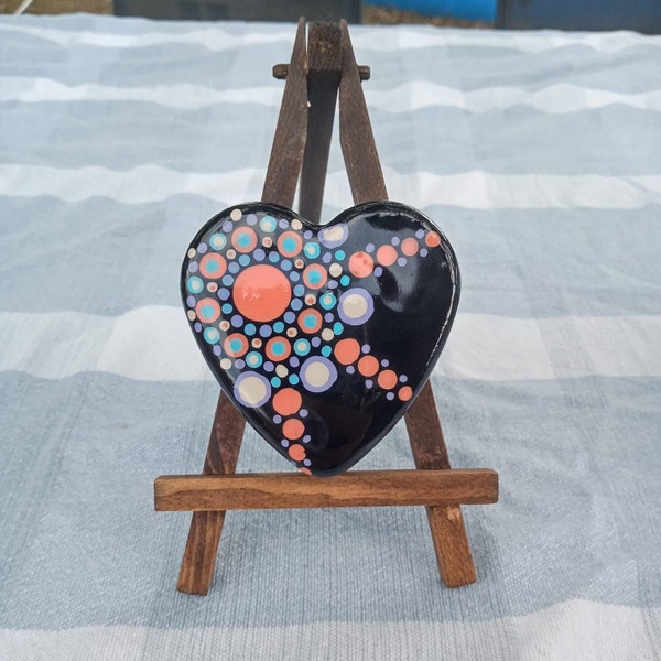 Orange on Black Heart Shaped Mandala Hand Painted Rock