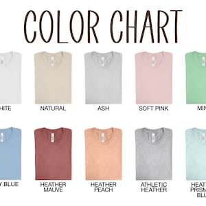 May include: Color chart featuring a variety of t-shirt colors. The chart includes white, natural, ash, soft pink, mint, baby blue, heather mauve, heather peach, athletic heather, and heather prism ice blue.