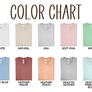 May include: Color chart showing 10 different t-shirt colors: white, natural, ash, soft pink, mint, baby blue, heather mauve, heather peach, athletic heather, and heather prism ice blue.