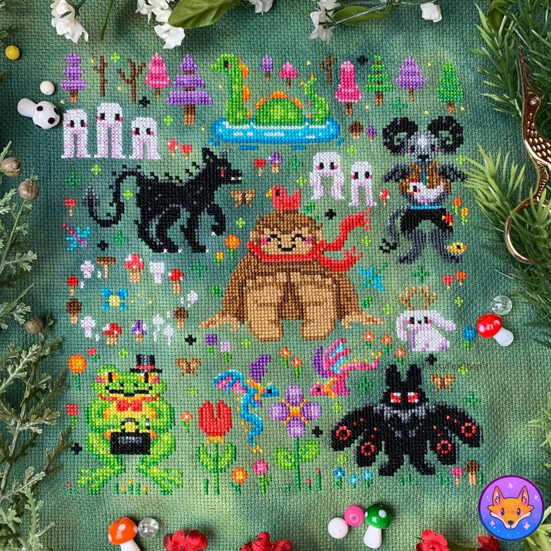 May include: Cross-stitch pattern featuring a whimsical forest scene with a variety of creatures, including a turtle, a bear, a frog, and a bat. The pattern is set against a green background with flowers and mushrooms.