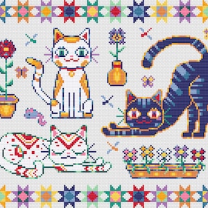 May include: A cross-stitch pattern featuring three cats with different colored fur and patterns. The cats are surrounded by flowers, butterflies, and a potted plant. The background is a white fabric with a colorful border.