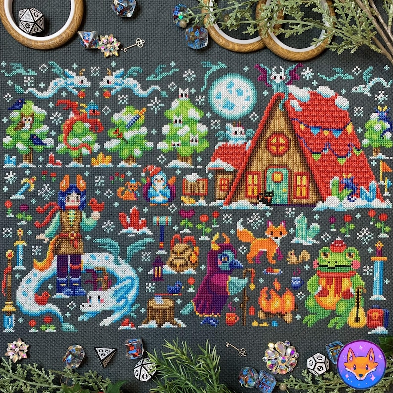 May include: A cross-stitch pattern featuring a cozy winter scene with a small cottage, a dragon, a frog playing a lute, a fox, and a wizard. The scene is set against a dark blue background with snowflakes and other wintery details.