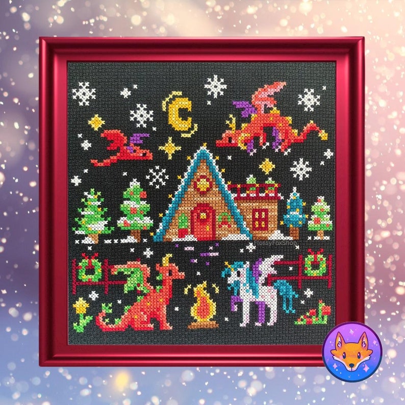 May include: Cross stitch pattern featuring a cozy cabin with a red roof, surrounded by snow-covered trees and a starry night sky. A red dragon, a purple dragon, and a unicorn are also featured in the design.