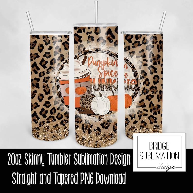 May include: Three 20oz skinny tumblers with a fall theme. The design features a leopard print background, pumpkins, and the text "Pumpkin Spice Junkie." The tumblers have a glittery bottom and come with a straw.