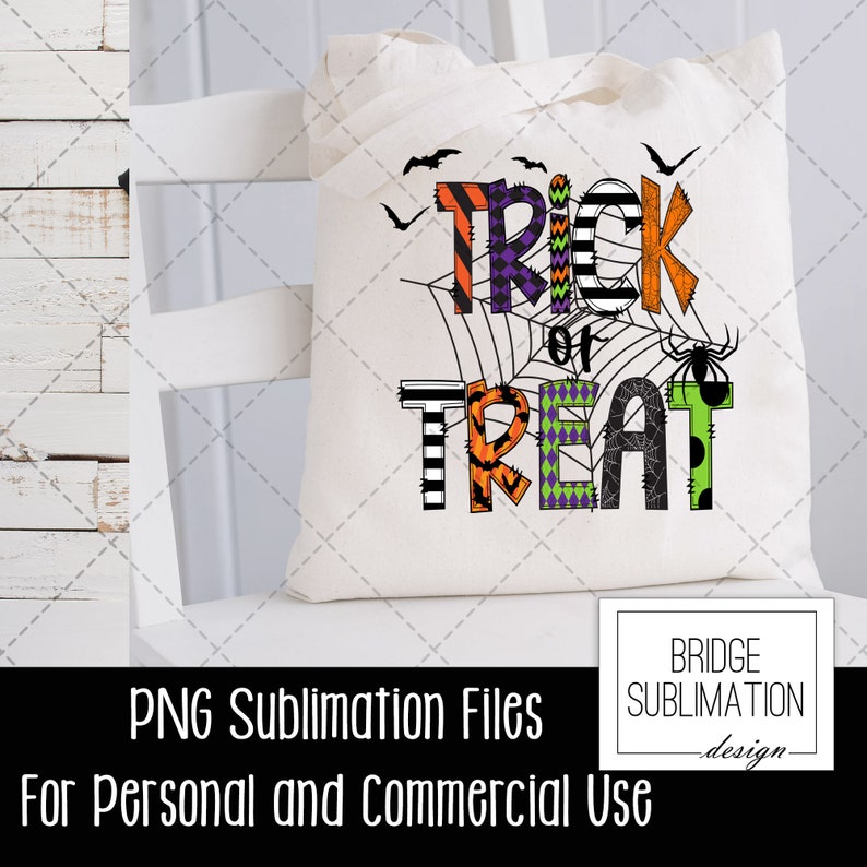 May include: A white tote bag with a colorful "Trick or Treat" design featuring a spider web, bats, and spiders. The text is in black, orange, green, and purple with a striped and checkered pattern.
