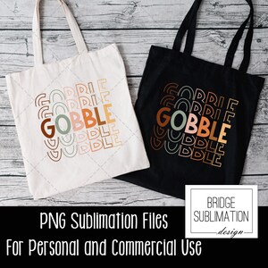 May include: Two tote bags, one white and one black, with the word "GOBBLE" in the center, surrounded by the word "GORRIE" and "WUDDLE" in a repeating pattern. The bags have long handles and are made of canvas. The text "PNG Sublimation Files For Personal and Commercial Use" is at the bottom.