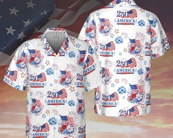 May include: A white short-sleeved button-down shirt featuring an all-over print of American flags, red and blue floral accents, star shapes, and the text 250 AMERICA 1776-2026. The shirt has a classic collar and a front button placket closure.