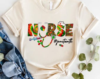 May include: A cream colored t-shirt with the word "NURSE" in colorful letters, a stethoscope, and the hashtag "#juneteenth".