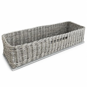 May include: A rectangular grey woven wicker basket featuring a sturdy flat base and integrated side handles. The basket is constructed with a tight, uniform weave pattern, showcasing a natural grey finish throughout the entire structure.