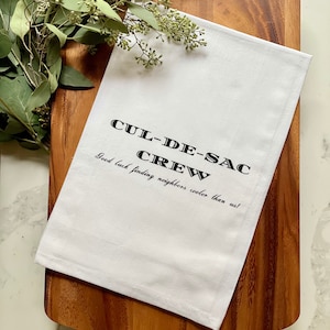 Tripulación de Cul-de-sac ¡Buena suerte encontrando vecinos más geniales que nosotros! - Paño de cocina