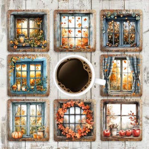 May include: Nine square coasters with watercolour images of windows depicting autumn scenes. Each coaster features a different window design, including falling leaves, candles, and fall foliage. A cup of coffee sits in the centre.