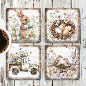 May include: Set of four square coasters with Easter-themed designs. Each coaster features a different watercolor illustration: a bunny with eggs, a nest with eggs, a vintage truck with flowers, and two birds in a nest, all on a rustic wood background.