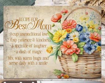 Puede incluir: Una tabla de cortar blanca con un diseño floral y el texto "RECIPE FOR Best Mom" con una lista de ingredientes para una receta para la mejor mamá. Los ingredientes incluyen amor incondicional, paciencia, amabilidad, risa y magia. La tabla está decorada con una cesta de flores.