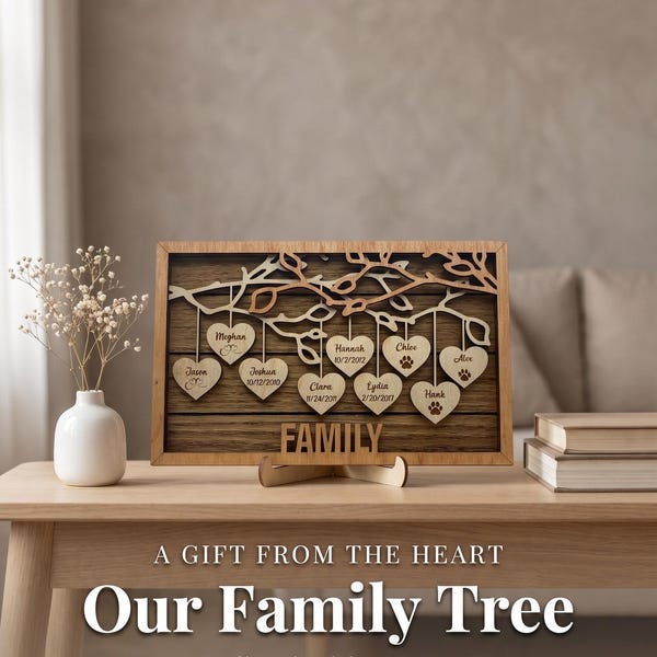 May include: A rectangular wooden family tree display featuring a layered design with a tree branch silhouette. Hanging from the branches are several heart-shaped wooden ornaments, each engraved with a name and date. The word FAMILY is at the base.