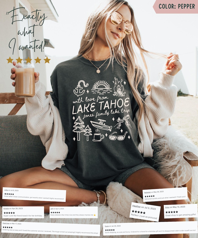May include: A pepper-colored sweatshirt with a white graphic design featuring an anchor, trees, a boat, and the text "with love from LAKE TAHOE jones family lake trip." The image also includes the text "Exactly what I wanted!"
