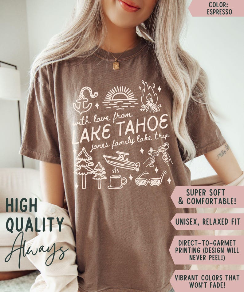 May include: Espresso-colored t-shirt with a white graphic design featuring an anchor, lake scene, campfire, trees, boat, coffee cup, and sunglasses. The text reads "with love from LAKE TAHOE jones family lake trip". The words "HIGH QUALITY Always" are also visible.