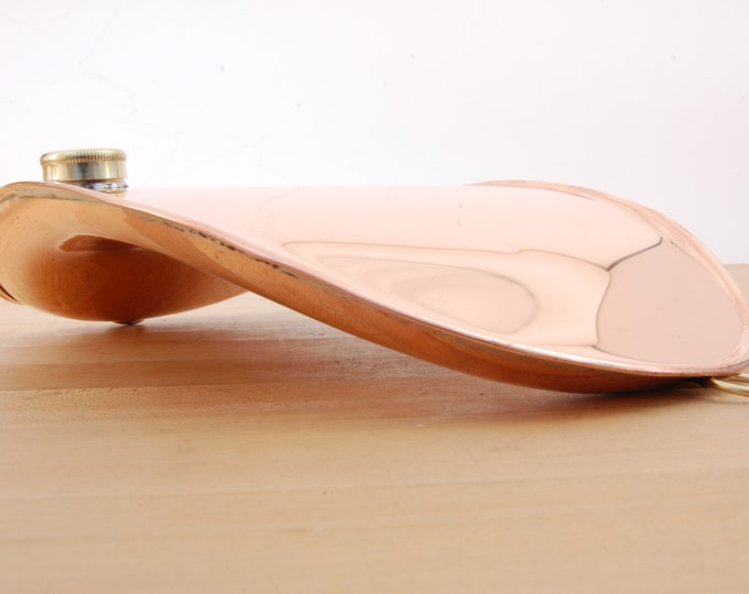 11" Flask. Made in West Germany. Copper. Very pretty organic shape. Small dent. Well sell vintage and antique copper cookware.
