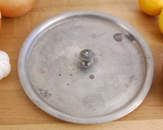 7" Benham & Sons London Stamped Vintage English Copper Lid. 1.5mm, 0lb. 13oz. Tin Coated. We carry vintage and antique copper cookware.