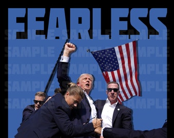 May include: A group of people stand in front of an American flag with the word "FEARLESS" in large blue letters above them. The person in the center is raising their fist in the air.